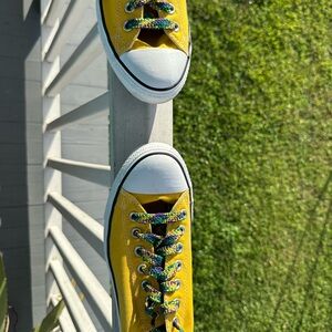 Converse men’s.  Yellow low tops. Size 10.   Laces. Mardi Gras laces .